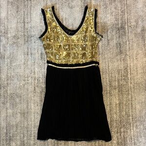 Elegant Black and Gold Sequin Dress